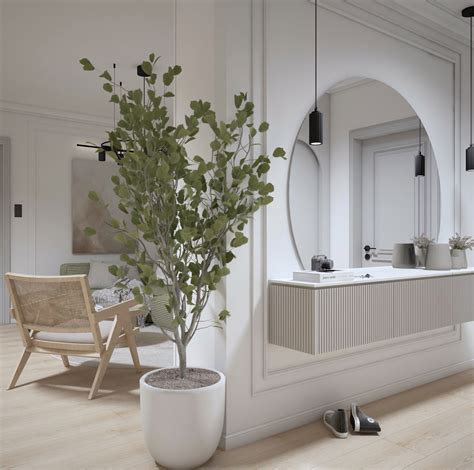 Štýlová predsieň s dobre umiestneným zrkadlom, rastlinami a osvetlením