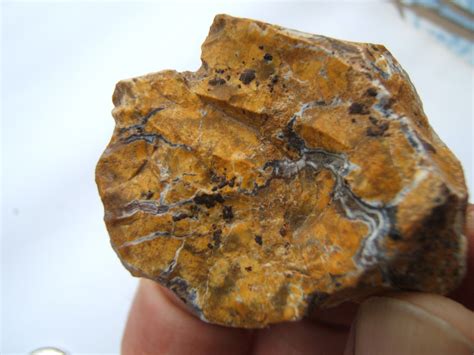 Detailná štruktúra brúseného jaspisu ukazujúca prirodzenú farebnú sedimentáciu