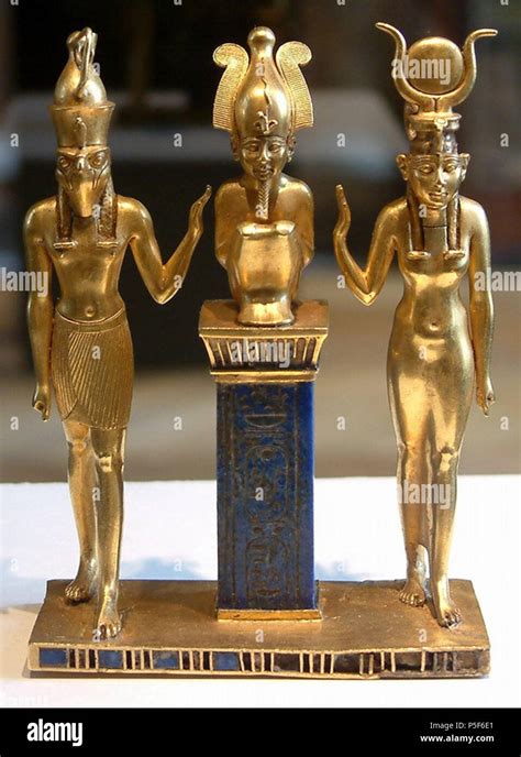 Abydoská trojica Horus - Usir - Eset na zlatom šperku Osorkona II.