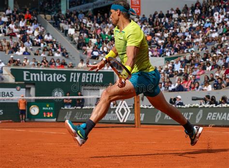 Rafael Nadal adjusts his shorts during a match
